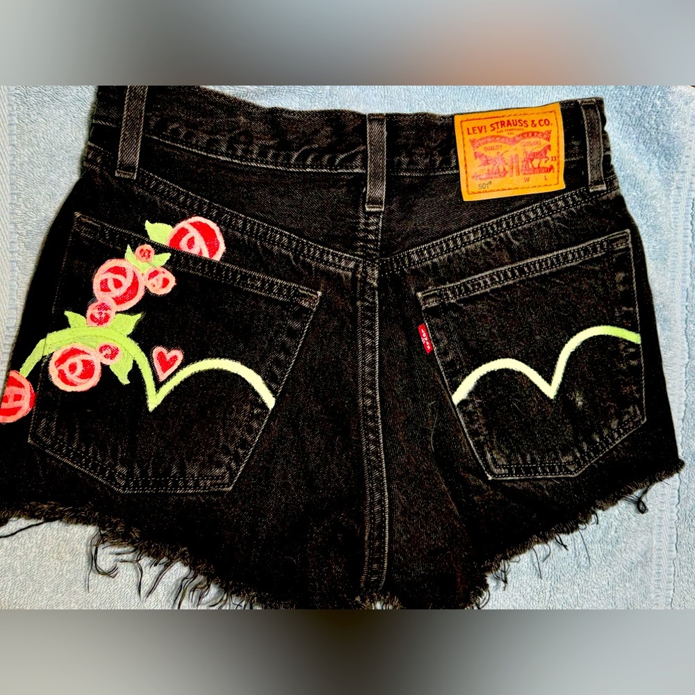 Hand painted 501 Levi shorts.
